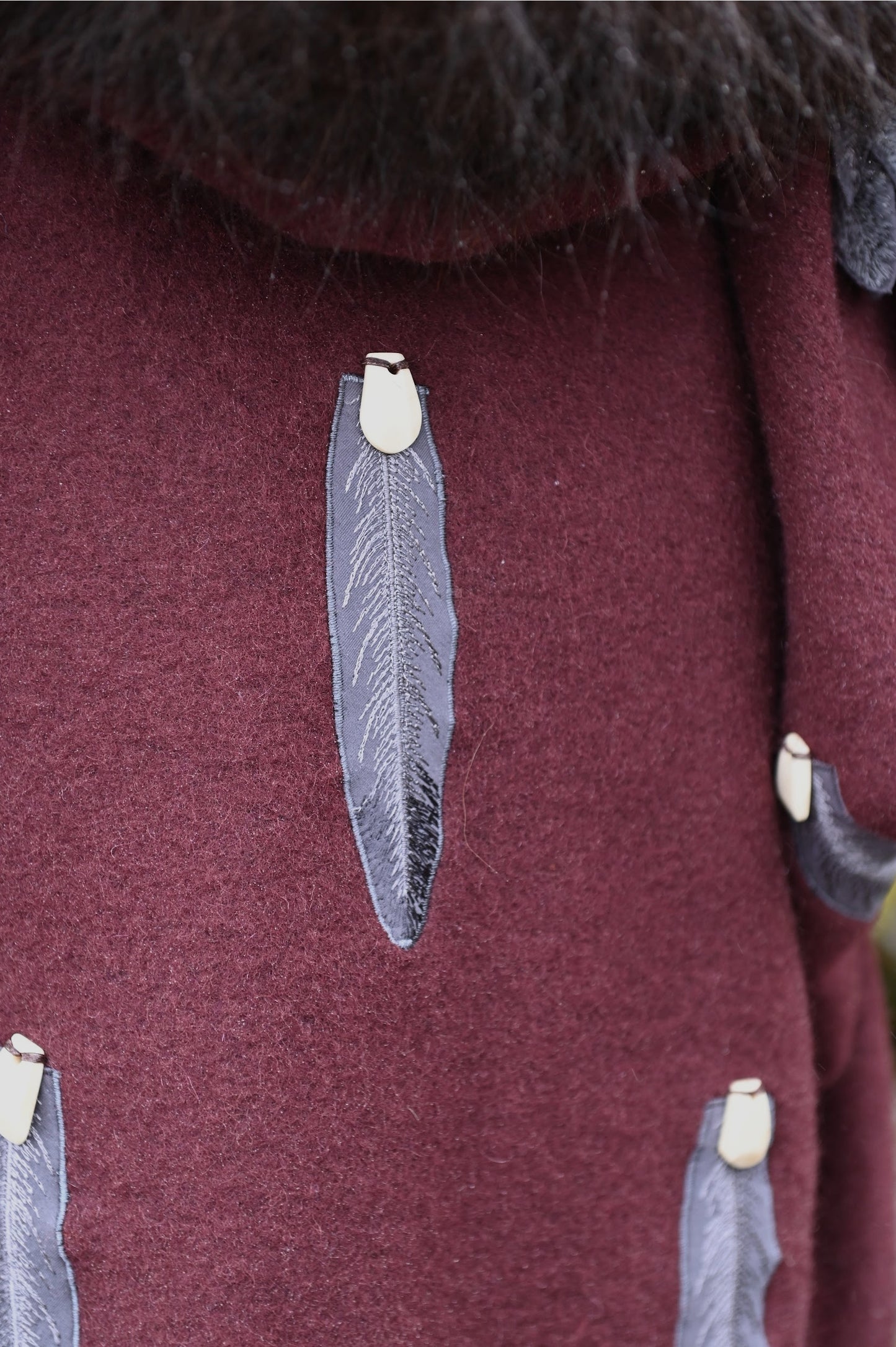 Feather and Elk Tooth Appliquéd Wool Coat with Bison Trim