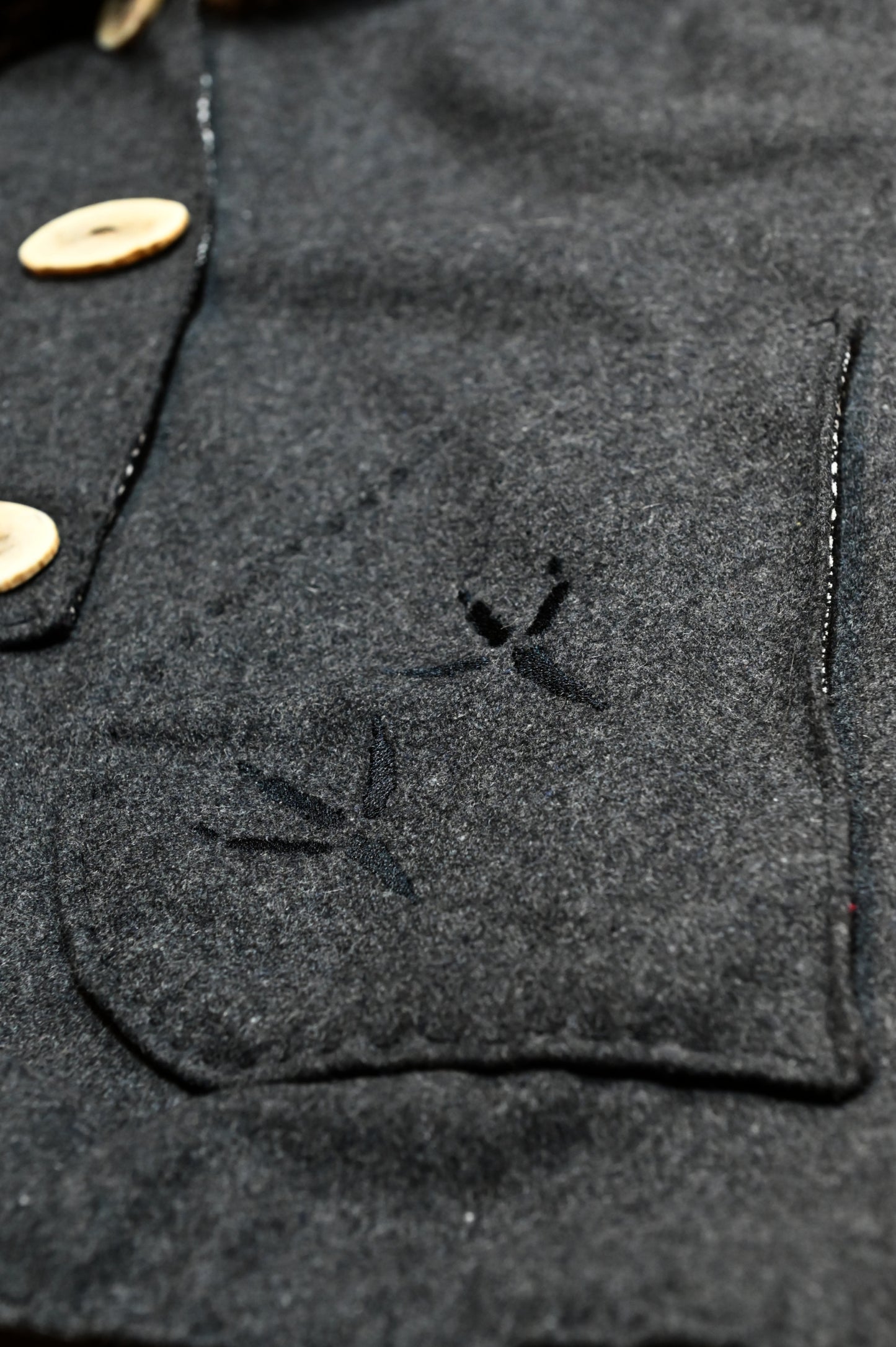 Raven Appliquéd Wool Vest with Bison Trim