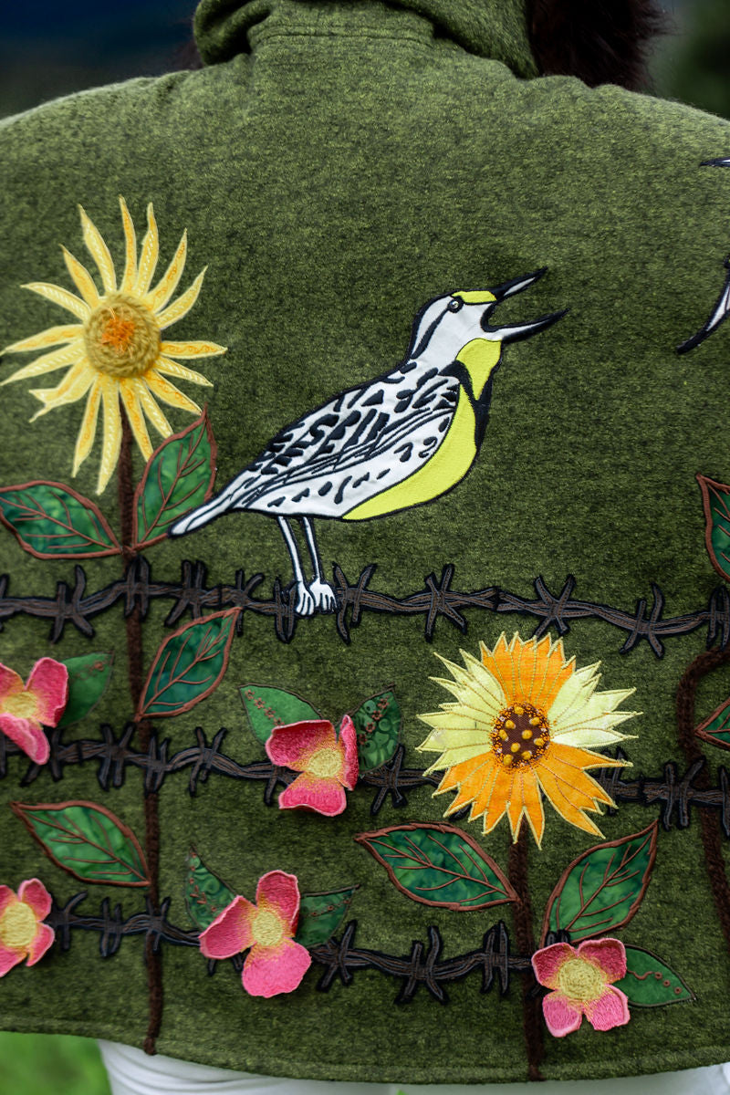 Western Meadow Lark Sings Bison-Trimmed Cape